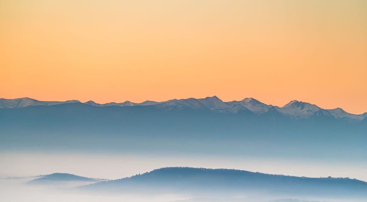 Misty mountains at sunrise